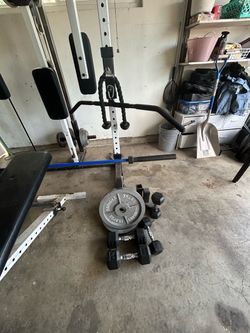 TuffStuff Home Gym Squat Rack with weights and bench