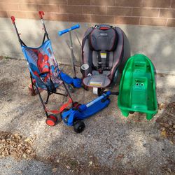 Delta Spiderman Stroller,Globber And Jetson Stand Up Scooters,Graco Car Seat And An Alligator See Saw