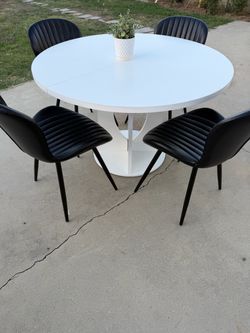Dining white round table with 4 black chairs included