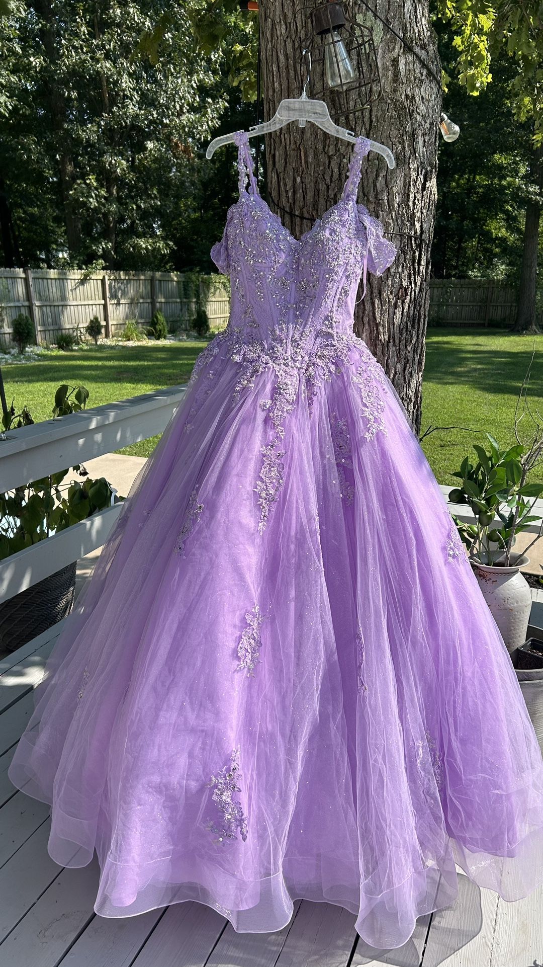 Quincanéra dress from Atianas’s Boutique ( WORN ONCE )