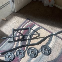 Weights 2- 10lb. 2-5lb. Workout Bar. And Pull Up Bar. 