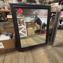 Black sparkly framed mirror