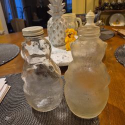 Two vintage 1950s snowcrest bear bottles