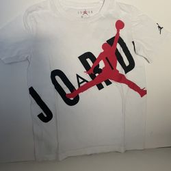  4 Jordan T-shirts and a pair of black Nike Dri-FIT athletic shorts