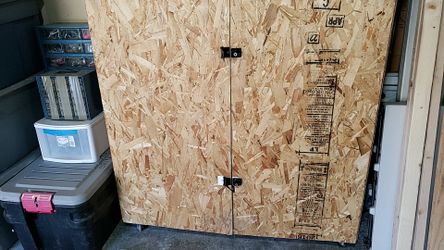 Wood storage cabinet