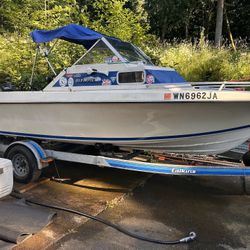 19’ Olympic Boat With Suzuki 140