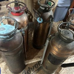 5 Brass Extinguishers.  