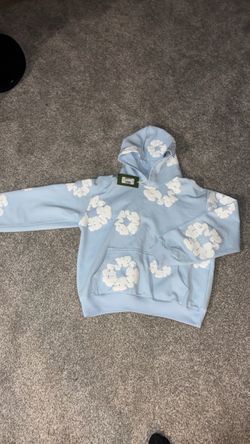 Light blue denim tears