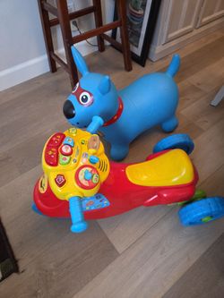 VTECH 2N1 ZOOM MOTORBIKE & SITNBOUNCE DOG SEE DESCRIPTION