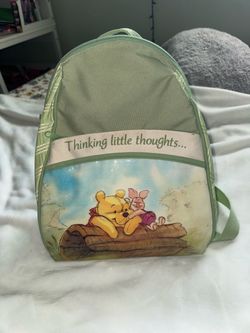 Winnie the Pooh green backpack-style diaper bag