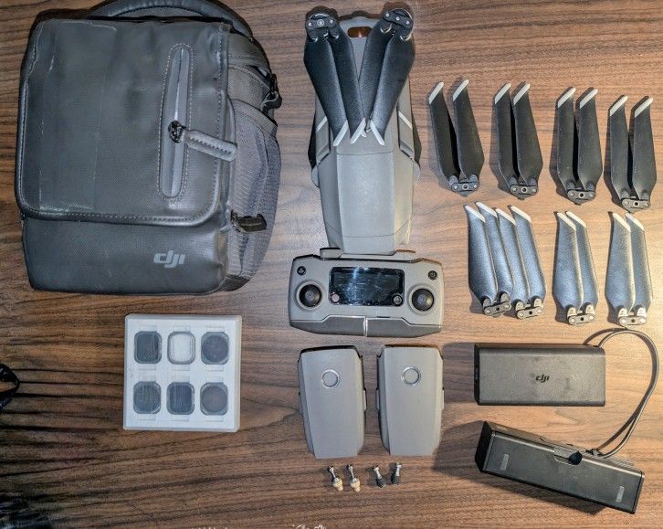 DJI Mavic 2 Pro with 2 extra batteries, 2 extra sets of blades, pro thumb sticks, and filter lenses