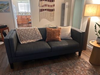 Charcoal gray mid-century modern tight back sofa. – Excellent used condition.