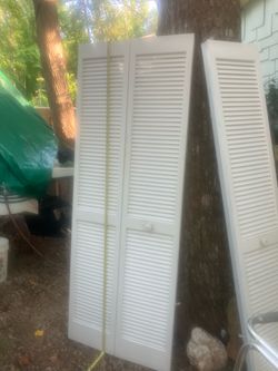 By folding shutter doors louver