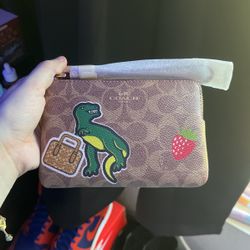 Coach Dinosaur Graphic Wristlet