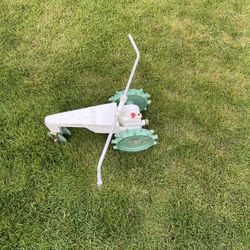 Vintage “walking” sprinkler