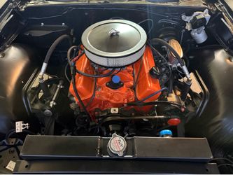 small black Chevy 283