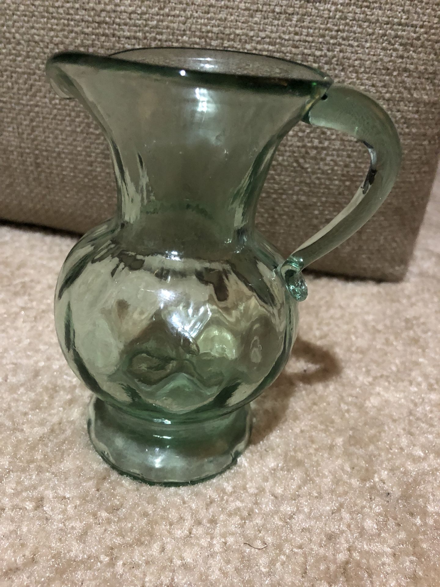 Vintage green glass pitcher