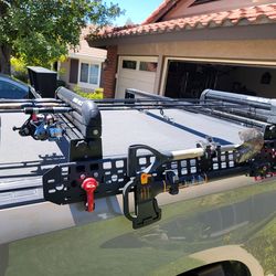 Chevy Silverado tonneau with billiebars (bed rack)