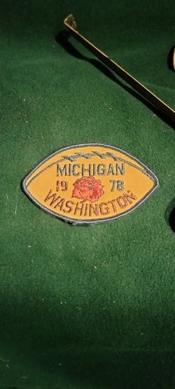 The vintage patch in the image commemorates the 1978 Rose Bowl football game between the Michigan Wolverines and the Washington Huskies. 