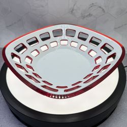 Vintage Guzzini bread/Fruit  basket from the Italian brand's line, featuring a two-tone design with a solid white interior and a vibrant red exterior.