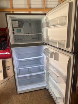 LG 30 in. W 20 cu. ft. Top Freezer Refrigerator w/ Multi-Air Flow and Reversible Door in Stainless