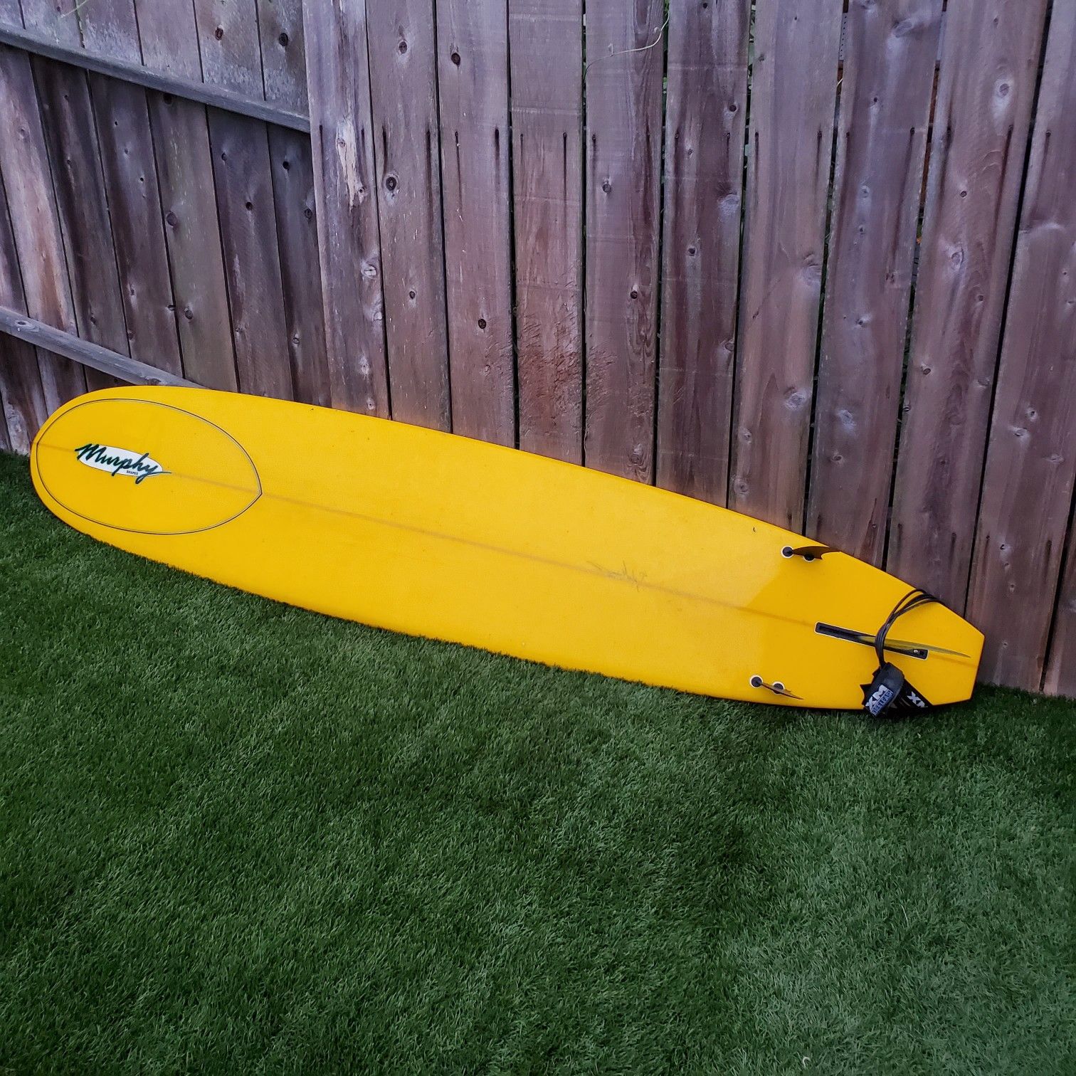 $200 cash only. 9'6" Murphy surf board