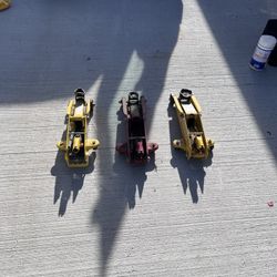 Floor jacks with handles