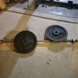 Olympic Bar With Pair Of 45lb Weight Plates