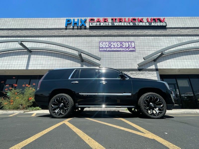 Cadillac-Escalade Wheels Tires Leveling & Lift Kits Accessories Lights Installations. (We finance..