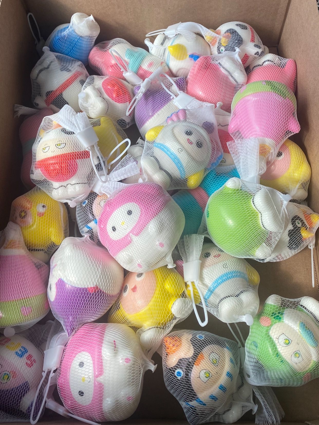Assorted Colorful Squishy In Mesh Bags