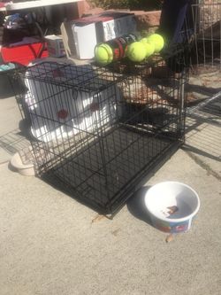 Small dog Crate$30 include Dog Bowlalso have large dog crate