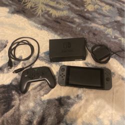 Nintendo Switch With Wireless Controller, Dock, Charger, And Hdmi Cord