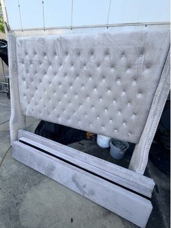 Upholstered gray and rhinestone bed fram