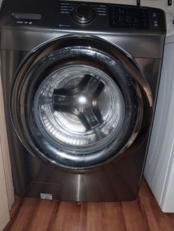 Washer and dryer and Vintige Granite top Dresser