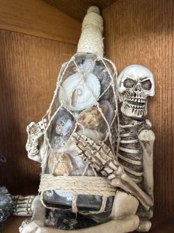 Skeleton wine holder