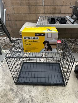 30” Foldable Metal Dog Crate with removable Tray and New Box of Kirkland XL absorbment pads