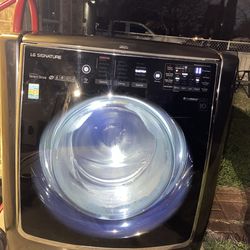 LG signature 5.8cu ft . Large wifi enabled front loader washer