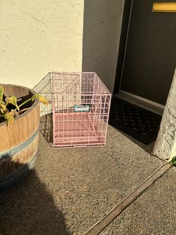 Pink wire dog crate