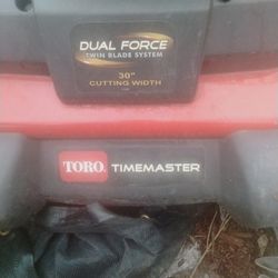 30" Toro Self-propelled 30-in Cut Dual Blade Has The Mulching Plug The Side Discharge And A Bag For It Less Than 6 Months Old