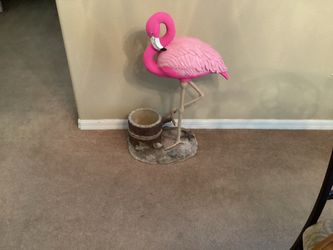 Beautiful flamingo with flower pot