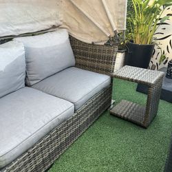 Patio set: 1 sofa, 1 coffee table and 1 side table in good condition, needs cleaning