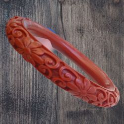 Vintage Faux Carved Cinnabar Bangle Bracelet
W/Carved Swirls