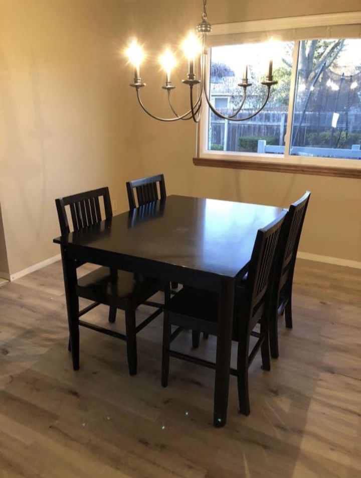 Black Chairs And Table Set