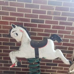 Vintage cast iron spring horses