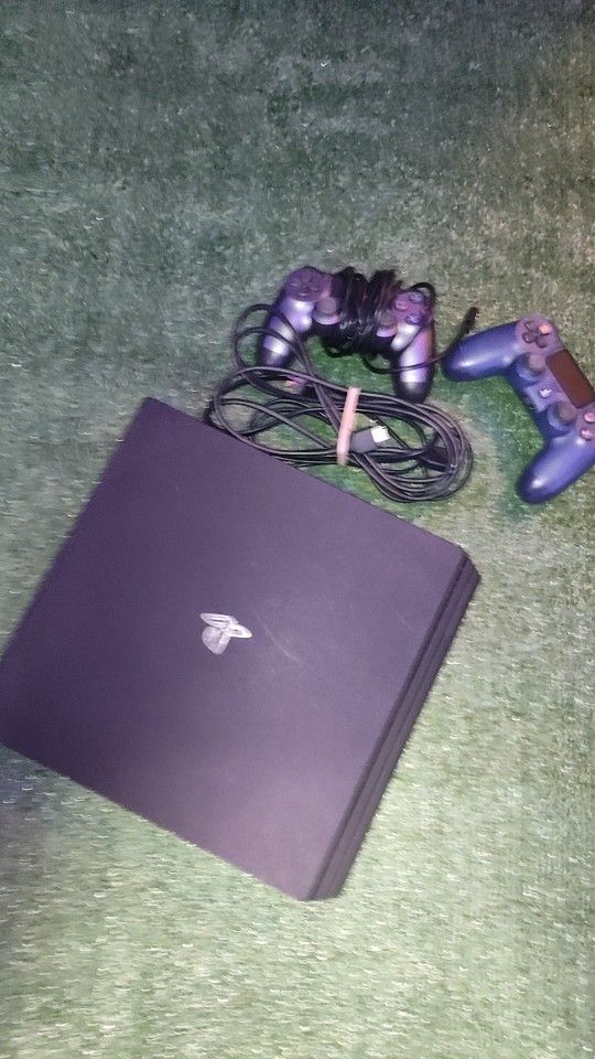 PS4 And 2 Controllers