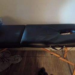 Massage table