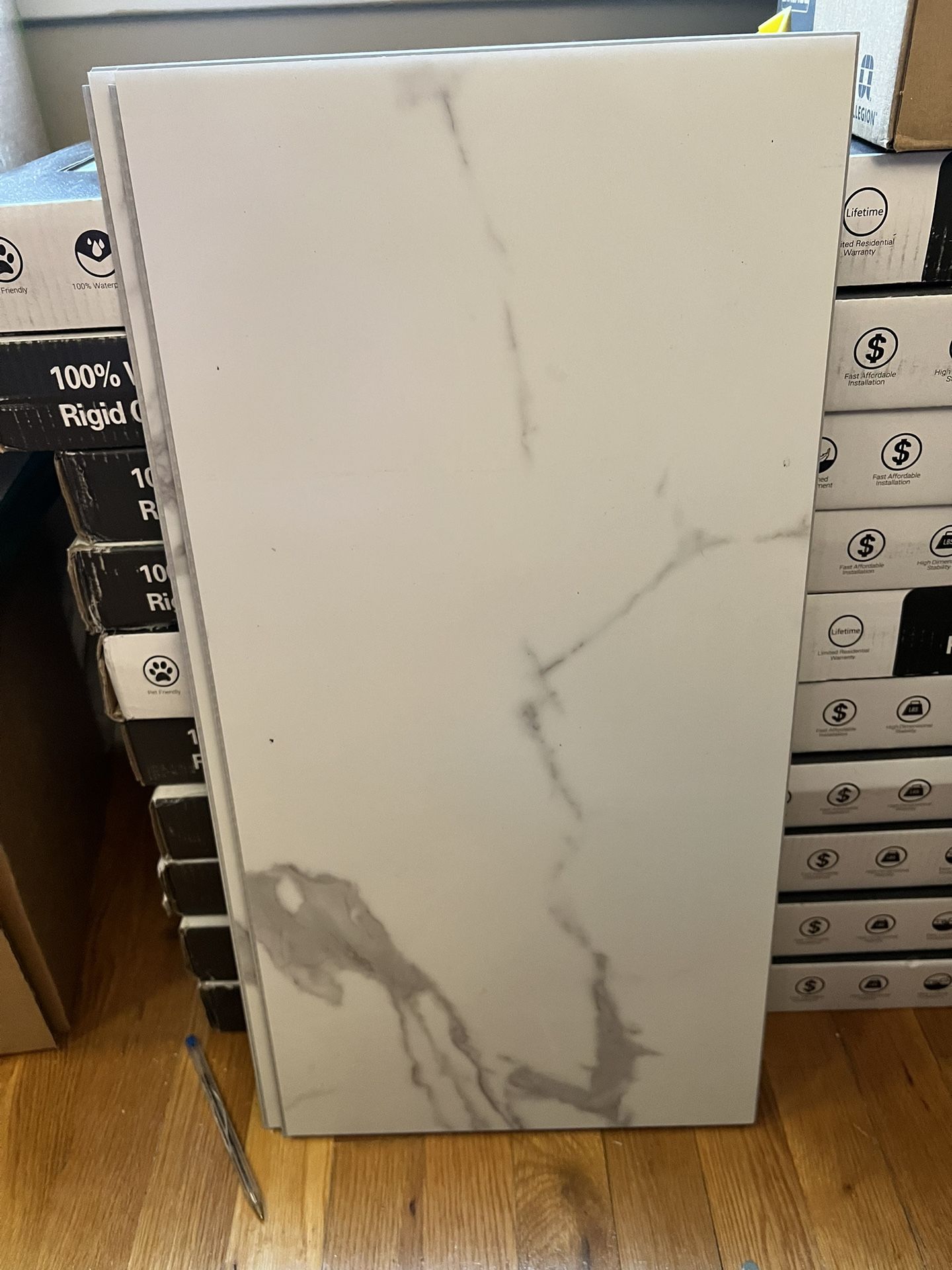 Carrara Luciano Lvl 12x24 Vinyl Tiles