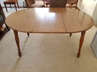 Awesome Hardwood Table. 2 leaves included.