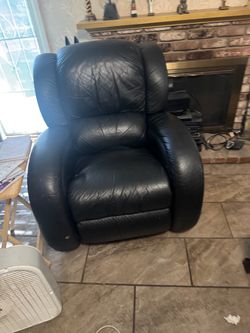 Leather rocking/reclining chair