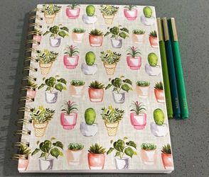Notebook with pens